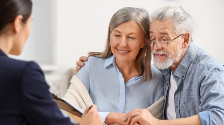 Notary consulting senior couple about Last Will
